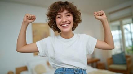 Happy Woman Celebrating in Bright Room