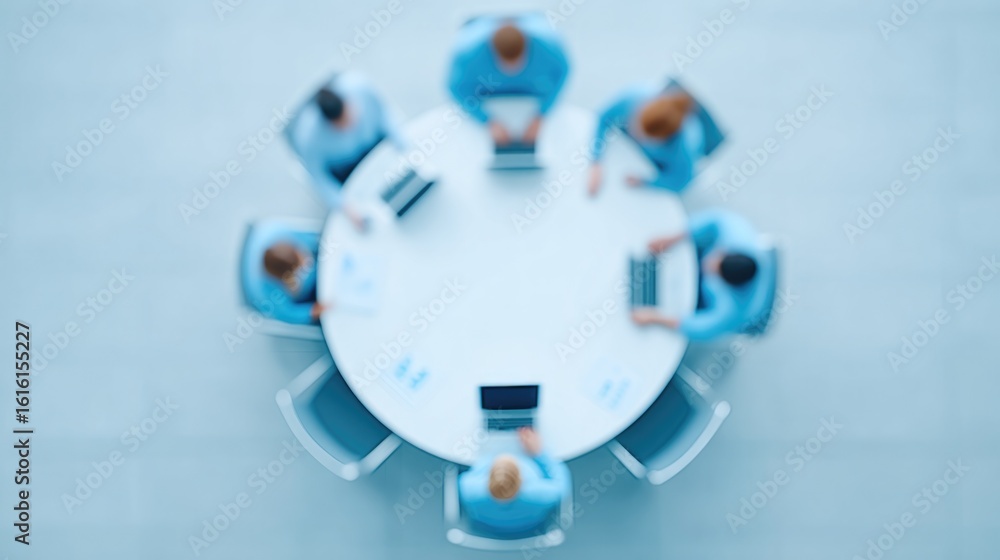 Poster group of professionals collaborates at sleek round table with laptops representing open innovation d