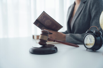 Law and Order: A close-up captures a person, immersed in the legal world, with a gavel and a law...