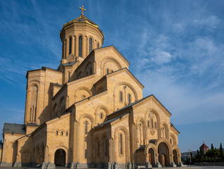 Fototapeta premium Holy Trinity Cathedral of Tbilisi is also know as Sameba Cathedral. Its neo-Byzantine architecture features a golden dome and impressive scale, reflecting Georgian religious revival.