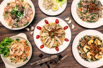 popular traditional vietnamese food dishes on restaurant table in vietnam