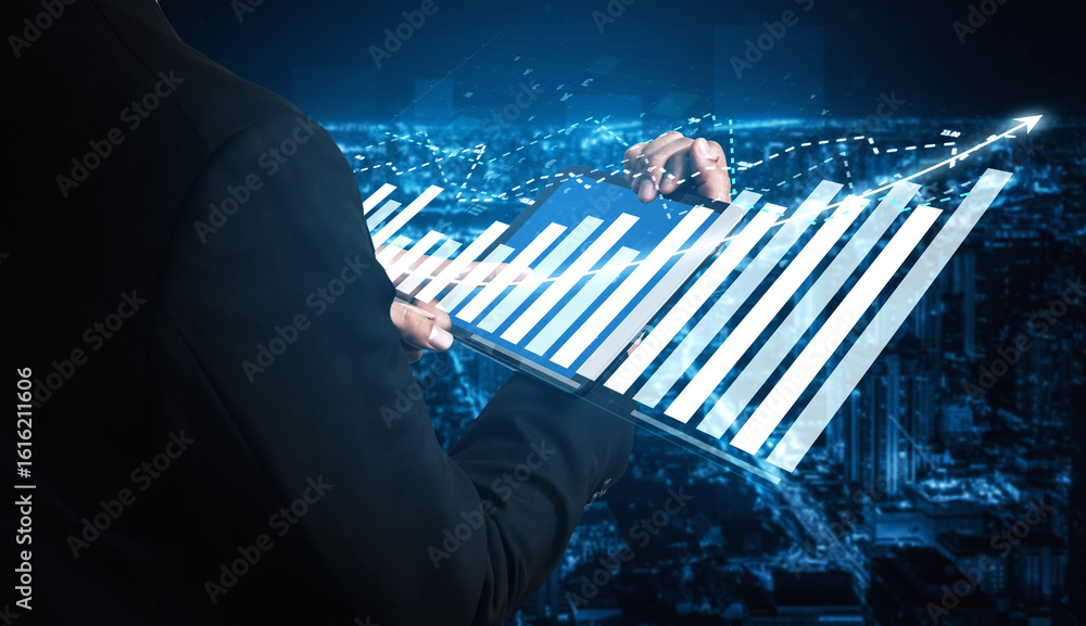 Poster a businessman interacts with a digital interface showcasing data trends and graphs, set against a vi