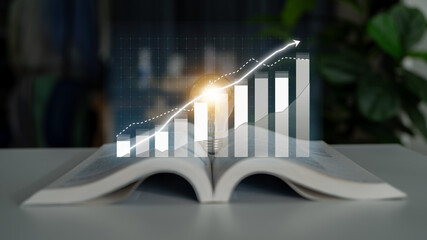 An open book displays a glowing light bulb alongside an upward trend graph, representing knowledge, innovation, and growth in the realms of education and business. Impute