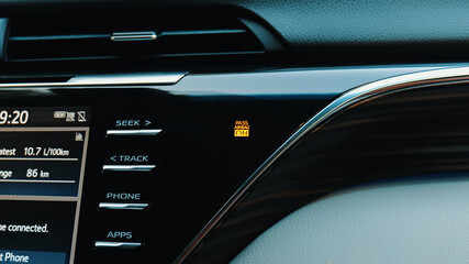 Dashboard warning light indicating passenger airbag status in a modern vehicle