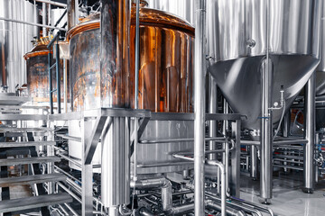 Modern brewery factory with stainless steel tanks and brewing equipment