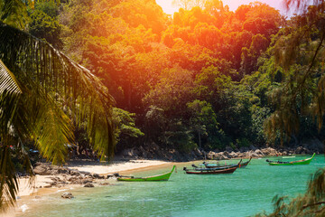 Scenic view of Banana beach in phuket, thailand with turquoise water and lush greenery