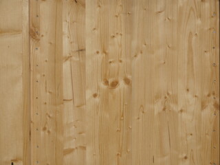 A wooden surface with a grainy texture