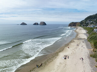 The Pacific Ocean washes against the scenic beach at Oceanside, Oregon. This beautiful area, near...
