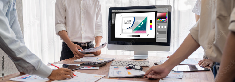 Aufkleber graphic designer software for modern design of web page and commercial brisk ads showing on the comp