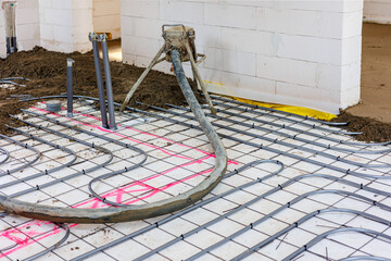 Concrete Floor Foundation Preparation with Reinforcement Mesh, Interior of building under...