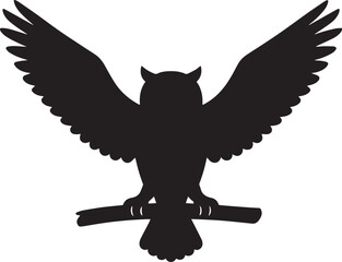 Fototapeta premium Black owl silhouette perched on branch with wings spread bird