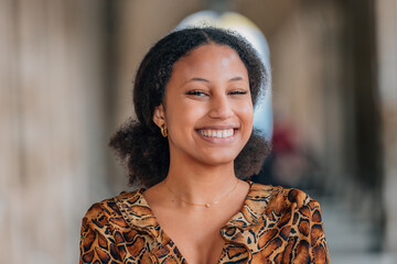 portrait of a young latina woman on the street