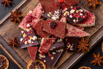 Bar sweet craft artisan chocolate with dried fruits made at home. Craft chocolate
