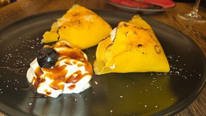 Chestnut pancakes with whipped cream. Filloas or frixuelos. Typical dessert of Galicia and Asturias...