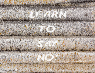 Learn to say no symbol. Concept words phrase Learn to say no on beautiful grey stone wall....