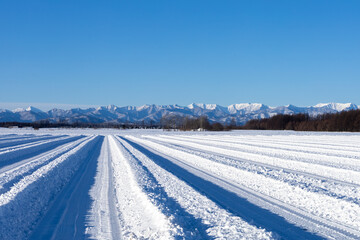 Mountains and winter fields in the Hidaka Mountains