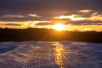 Winter roads freeze and reflect the sun