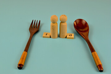 Wooden figures stand sentinel