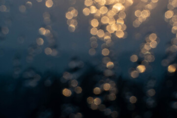 Golden light refracts through water