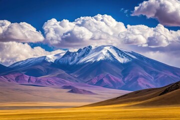 Majestic snow capped volcano under a dramatic cloudy sky