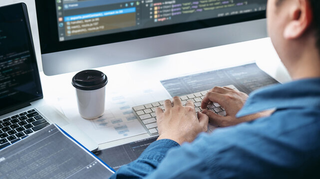 Professional Development programmer working in programming website a software and coding technology, writing codes and data code, Programming with HTML, PHP and javascript - Powered by Adobe