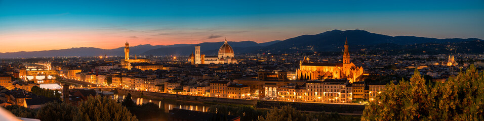 Panoramic Sunset View of Florence, Italy. The lights on the streets are lit to add contrast to the view.