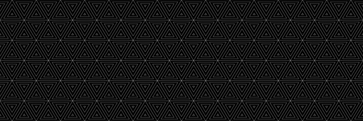 horizontal seamless blended white triangle and hexagon pattern on black for design and background.