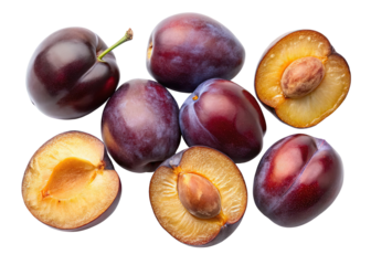 A vibrant overhead view showcases ripe plums some whole and others halved revealing their juicy golden flesh against a stark black background
