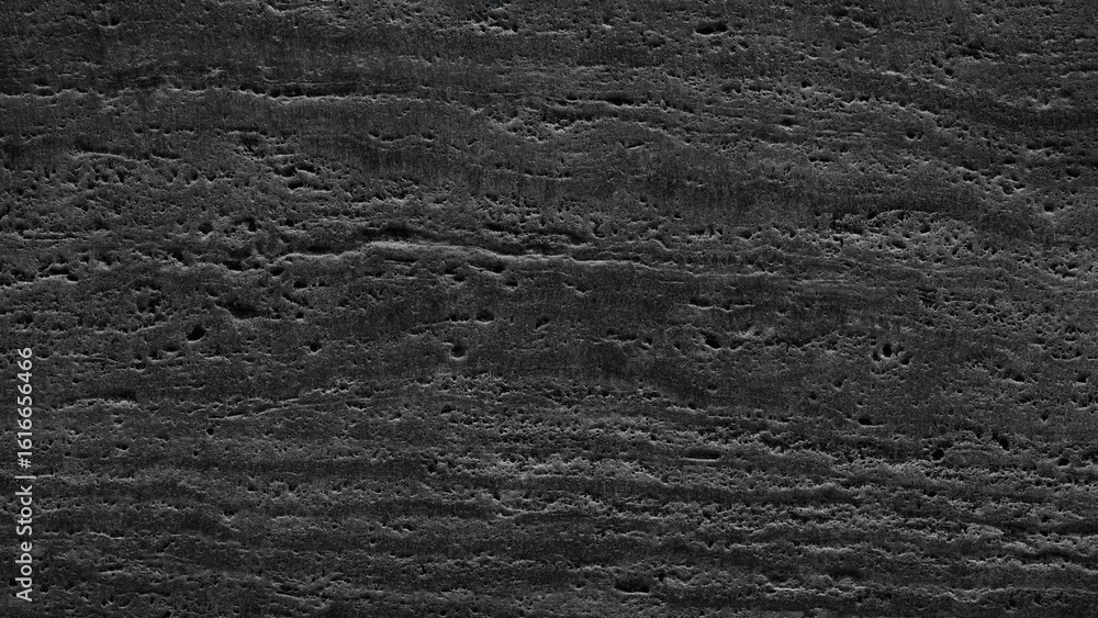 Poster black wall with a pattern of small holes. wall is very smooth and has a very clean look, texture bac