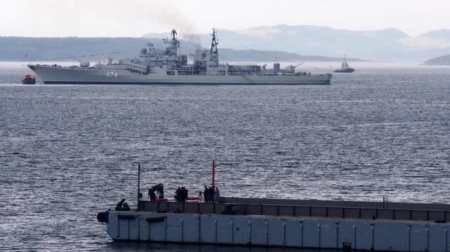 Navy Day.The boat Admiral Ushakov at the roadstead in the Kola Bay. Cloudy cold summer day.