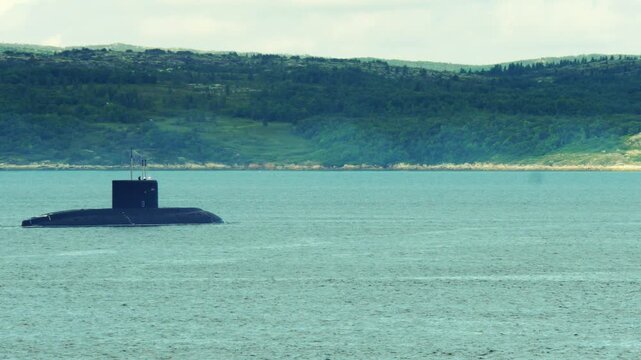 Varshavyanka project submarine sails through the Kola Bay.