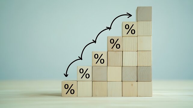 Wooden blocks with percentage symbols and arrow graph chart