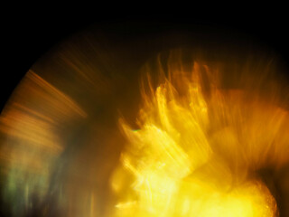 Colorful light leaks on black background for design and special effects. Retro film look. Abstract...