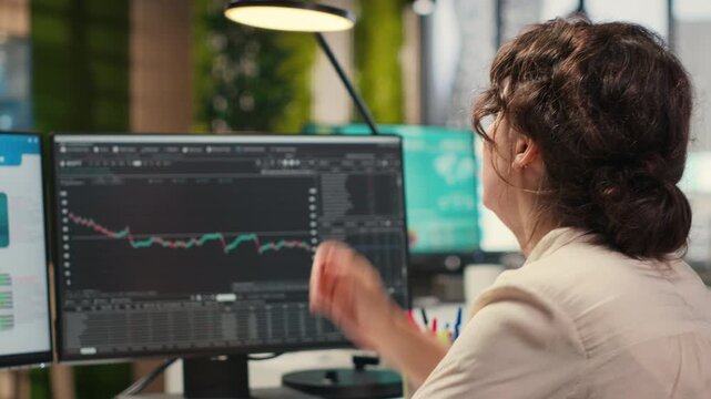 Worried finance advisor looks at forex trends market fall and losing money, dealing with a financial crisis due to stock crash price drop. Frustrated manager under pressure, bankruptcy. Camera B.