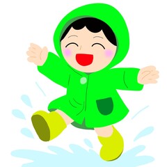 レインコート姿で水たまりを跳ねる子ども