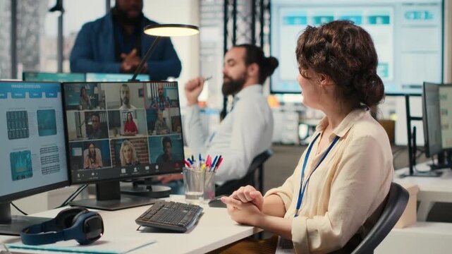 Employees sharing ideas on a web video conference call at the workstation, discussing about project briefing with charts and reports. Business associates attending online meeting event. Camera B.