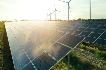 Solar panels and wind turbines outdoors. Alternative energy source