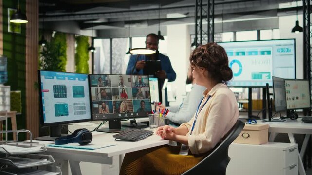 Employees sharing ideas on a web video conference call at the workstation, discussing about project briefing with charts and reports. Business associates attending online meeting event. Camera A.