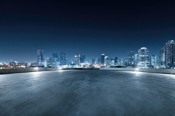 Obraz premium Empty rooftop at night overlooking illuminated city skyline