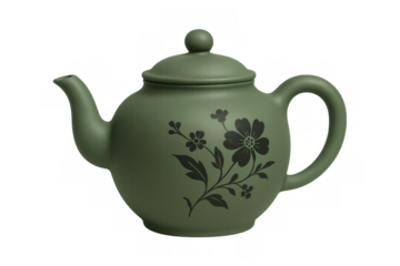 Ceramic green teapot featuring elegant black floral pattern, sitting against transparent backdrop for culinary design needs