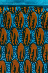 top view of dark blue ankara fabric, flatlay of nigerian wax cloth,   overhead view of blue ankara...