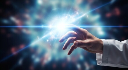 Fototapeta premium Hand reaching for bright celestial light with blue lens flare