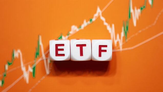 Exploring Investment Options ETF Letters on Orange Background with Stock Market Graph Illustrating Exchange Traded Funds and Financial Investment Strategies