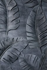 Dark gray textured wall with embossed banana leaf patterns