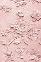 Delicate, embossed floral pattern on a soft pink background