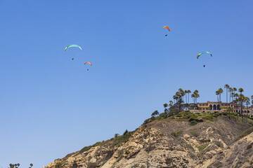 Paraglider flying high over Torrey Pines San Diego California 2025