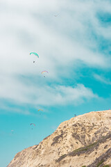 People paragliding over Black Beach La Jolla California 2025 