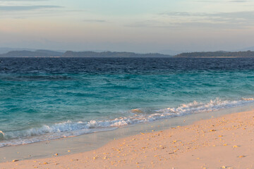 Turquoise Waves on Tropical Beach