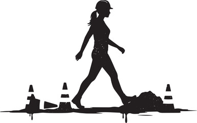 Silhouette of a woman in a hard hat walking through construction