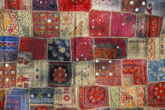 Colourful patchwork carpet with small mirrors, Rajasthan, India, Asia